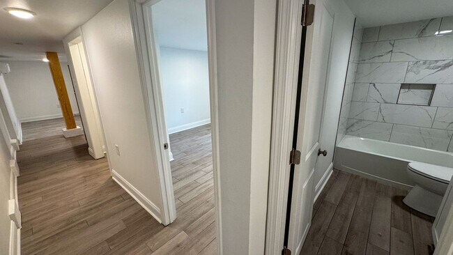 Building Photo - 7423-7429 Hampson - 7423 Basement Left