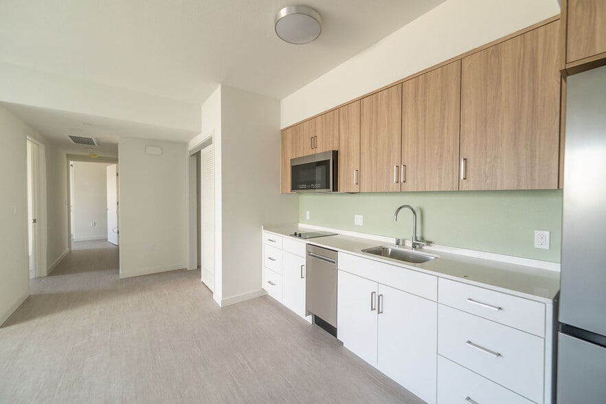 Building Photo - Secure Your Dream Home at RUMI – Fully Furnished Units with Stunning Views!