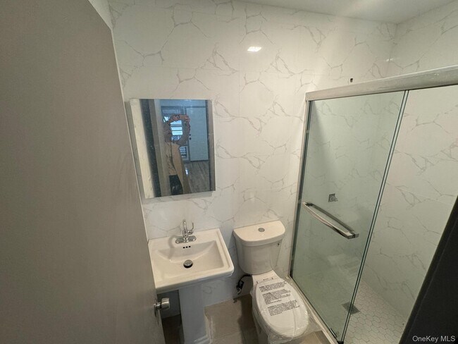 Building Photo - 104-60 48th Ave