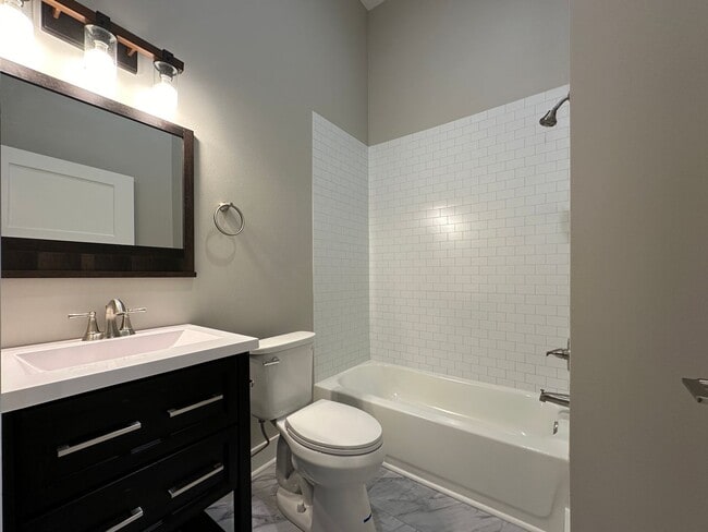 Building Photo - Charming Downtown Apartments