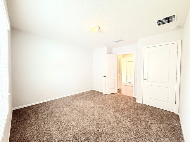 Building Photo - Spacious 4BR Home with Large Fenced Yard & Community Pool