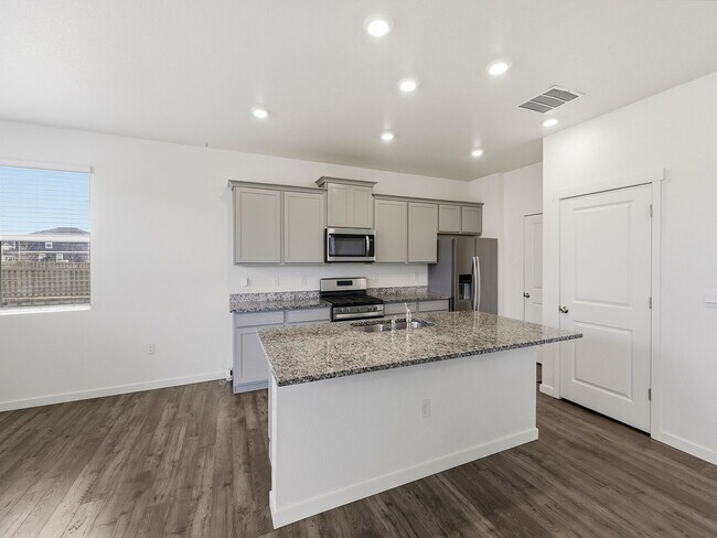 Building Photo - Beautiful Home in Severance with 3-Car Garage, Fenced Yard, and Central A/C!