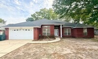 Building Photo - Spacious 4-Bedroom, All-Brick Home
