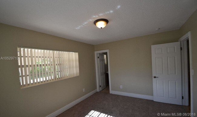 Building Photo - 3220 SW 118th Ct