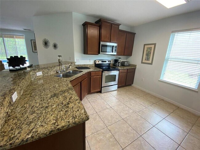 Building Photo - 9027 Paolos Pl