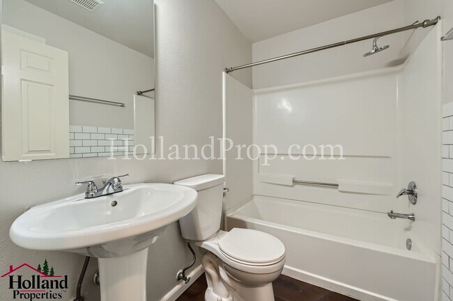 Building Photo - Spacious Home with High Ceilings and Modern Comforts!