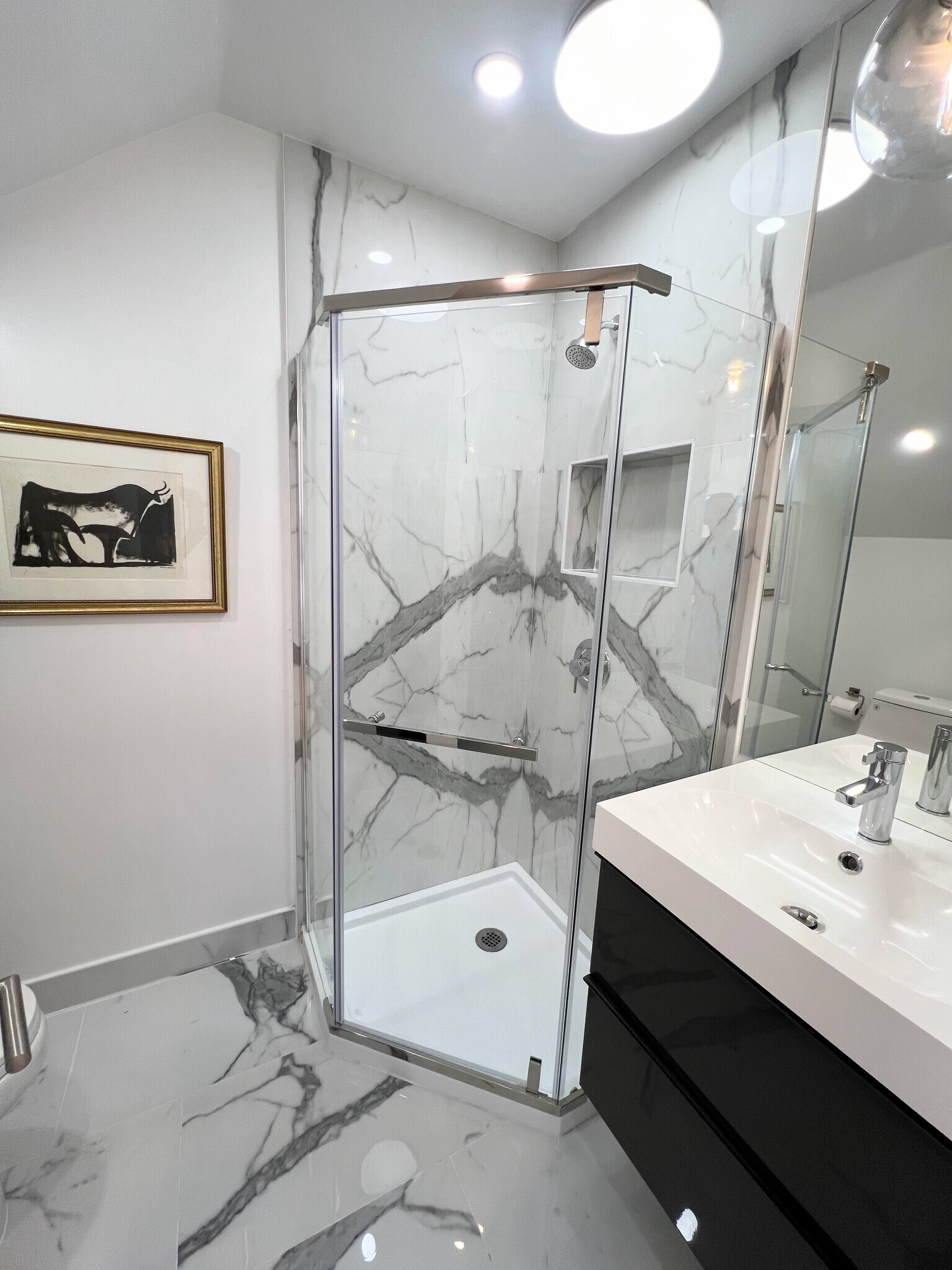 Downstairs guest bath with shower and storage - 2233 Manchester Ave