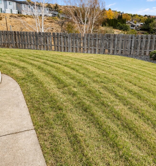 Building Photo - Finally… A Backyard Worth Bragging About This Summer!