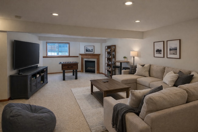 Building Photo - Spacious 3BR/3BA Condo with Finished Basement + 2-Car Garage — Available Now