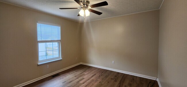 Building Photo - Fantastic 3 Bedrooms & 1.5 Bathroom, Two Story with a Garage!  Freshened Paint throughout!  Newer...