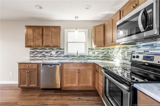 Building Photo - 705 Mosswood Ln
