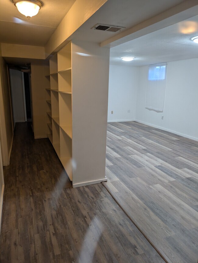 Lower level hallway and family room - 1160 Clinton St