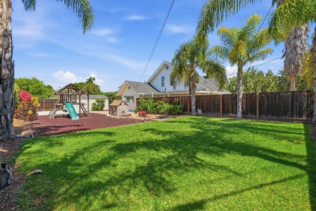 Building Photo - Light-Filled Home on Expansive Lot in Top-Rated School District with Vaulted Ceilings & Entertain...