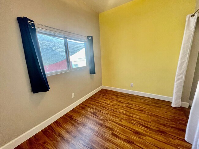 Building Photo - Prime Location! Modern 2BD/1 BA with A/C & EV Charging Steps from Mississippi