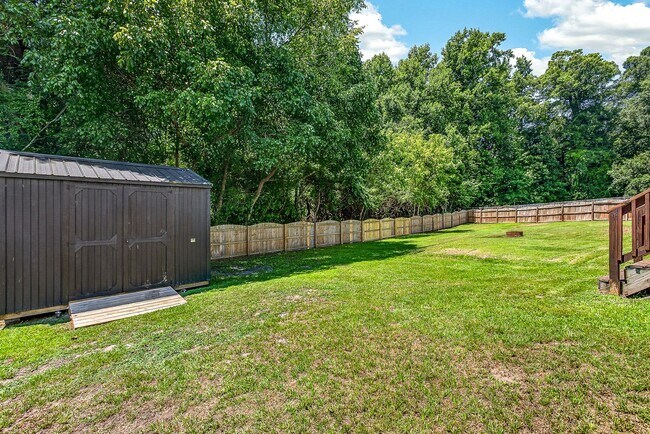 Building Photo - Charming Cow Horn Village Home with Outdoor Shower & Fenced Backyard