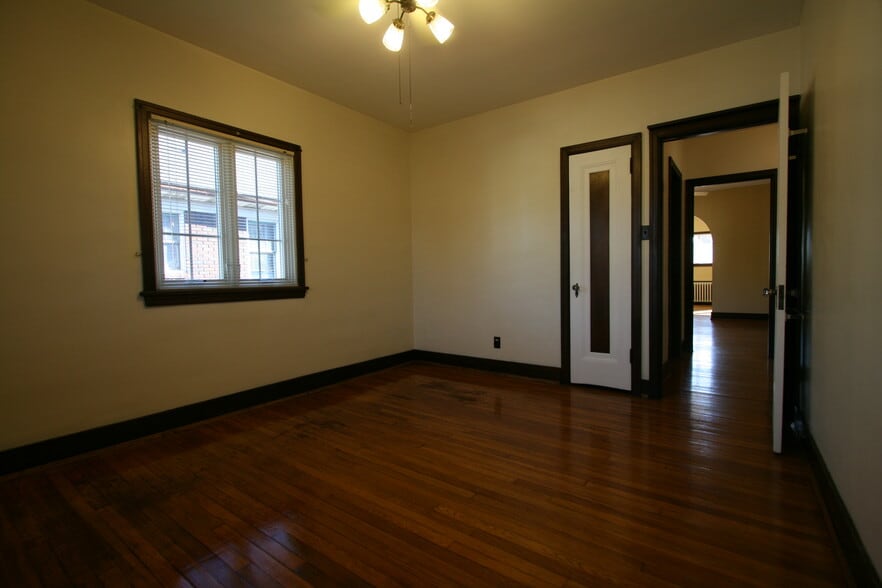 Bedroom on right looking towards dining room - 330 S Aiken Ave