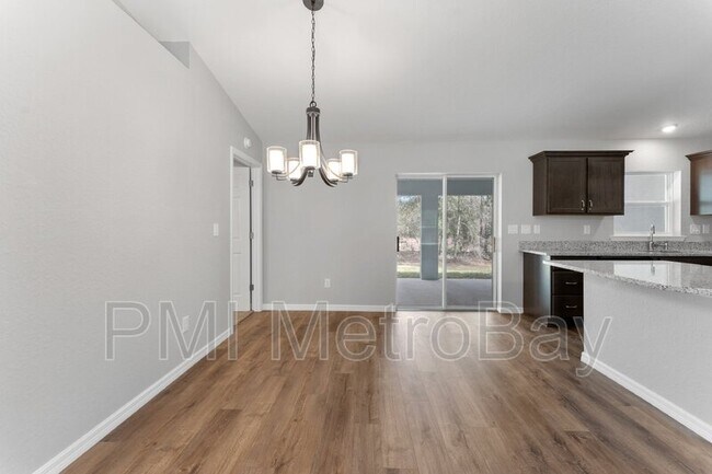 Building Photo - 9461 N Sandree Dr