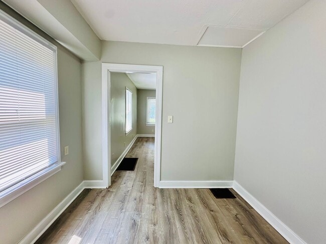 Building Photo - Updated two story home with unfinished bas...