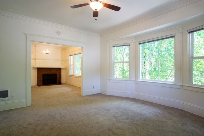 Building Photo - Lease this Beautiful Sullivan's Gulch Vintage 2-Bed w/Sunroom!