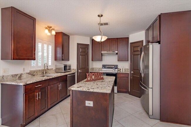 Building Photo - Comfort Meets Style in This Spacious Corner-Lot Home with Bonus Flex Room