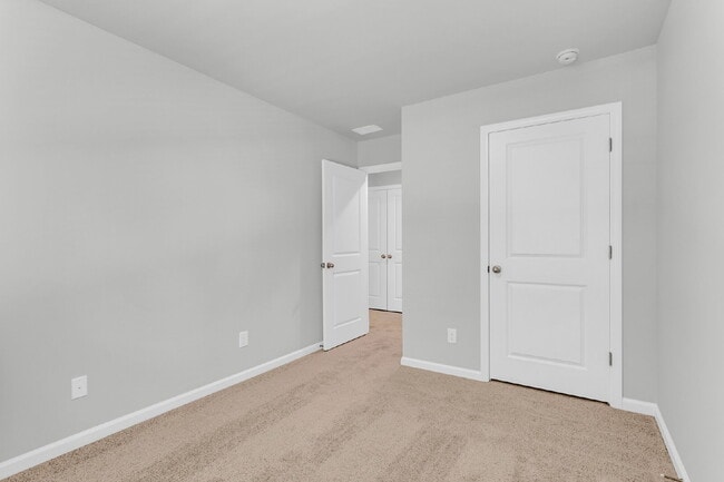 Building Photo - Beautiful Townhome at the Pines of New Hampstead