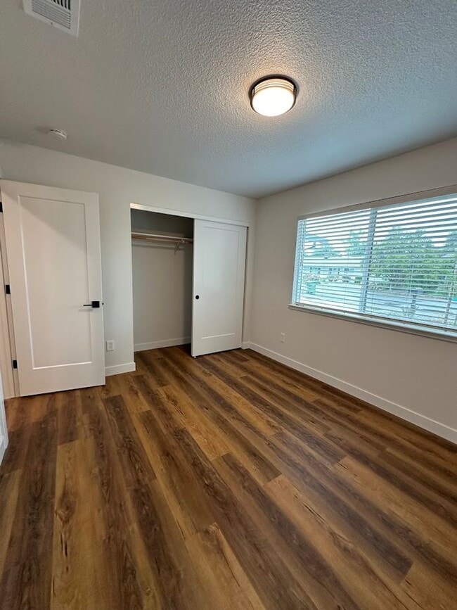 Building Photo - Updated Home with Island Kitchen, LVP Flooring, and Yard Care Included!