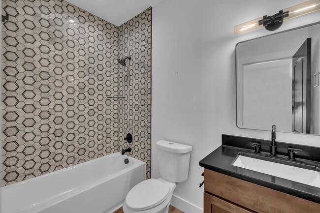 Building Photo - Modern New Construction Townhome with Roof...