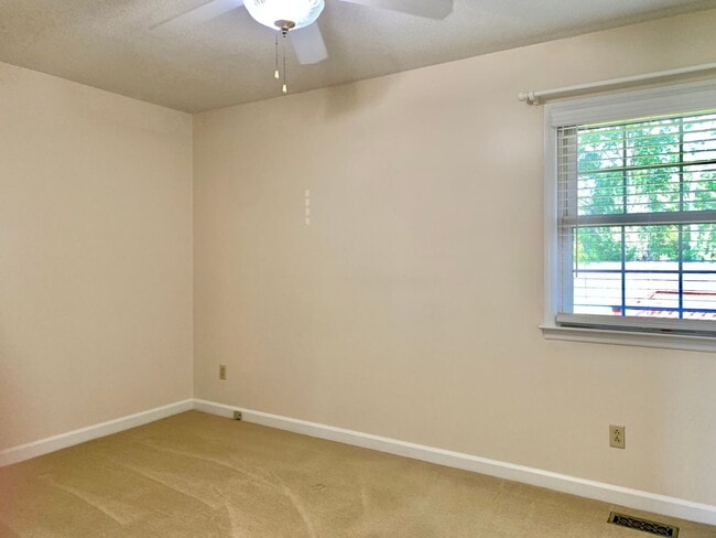 Building Photo - Charming Updated Home, Quiet Street Near Base, Fenced Yard!