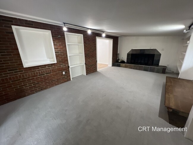 Building Photo - Charming 4-Bedroom Brick Ranch with Spacio...