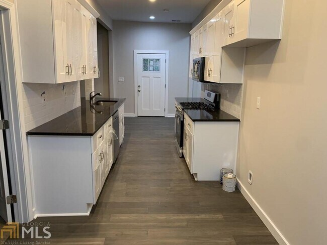 Building Photo - 6234 Collins St NE