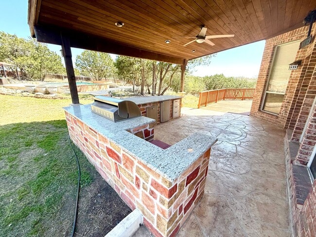 Building Photo - *COMING SOON* Luxurious 2-Story Home in Gated Stone Oak Community – Pool & Lawn Care Included