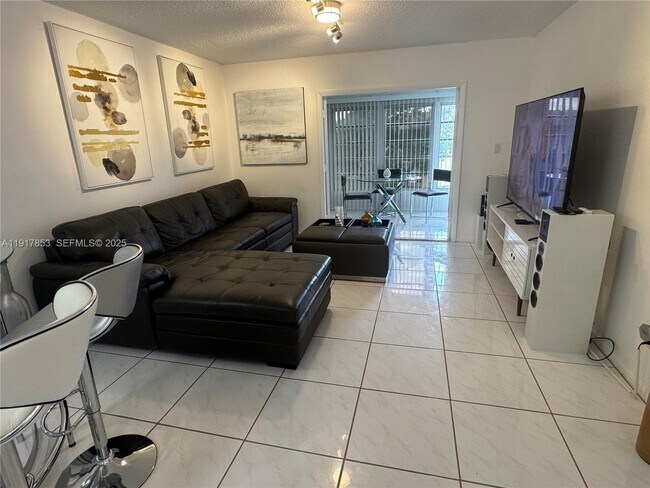 Building Photo - 6050 NW 64th Ave