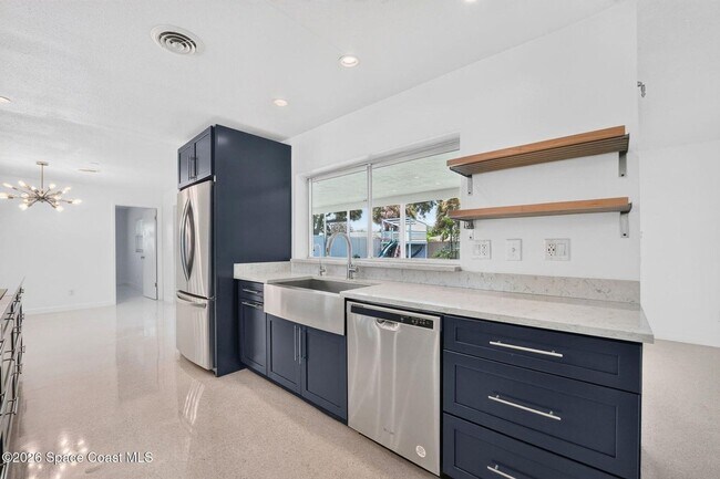 Building Photo - Welcome to this beautifully remodeled 4-bedroom, 3-bath home in the heart of Indialantic Beach!