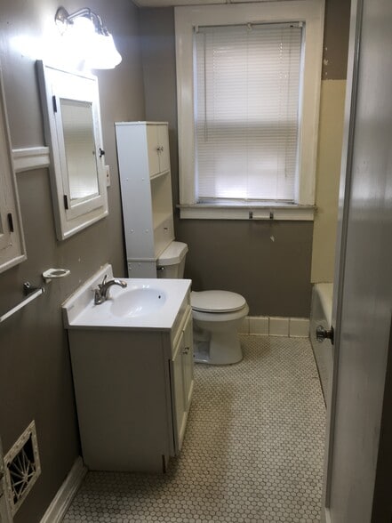 Bathroom with Original hex tiles - 4945 Mardel Ave