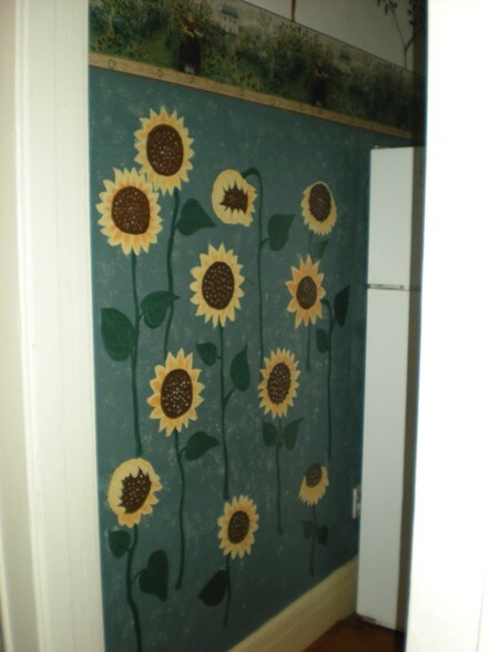 hand painted sun flowers in refrigerator rm. - 135 Roney Rd