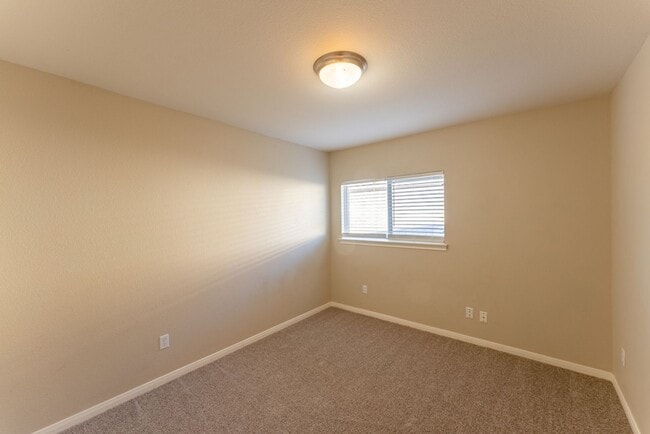 Building Photo - Charming Brick Home with Open Floorplan, Vaulted Ceilings, and Luxurious Amenities—Perfect for An...