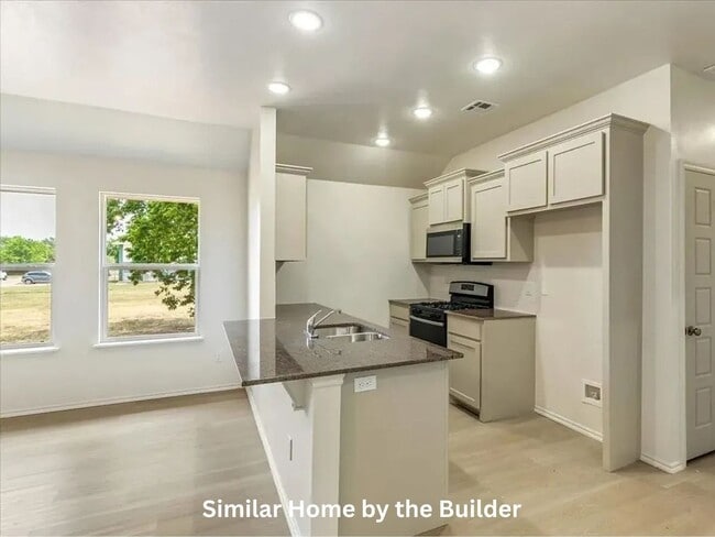 Building Photo - Move-In Ready 2-Bed Home | Garage + Pet Friendly