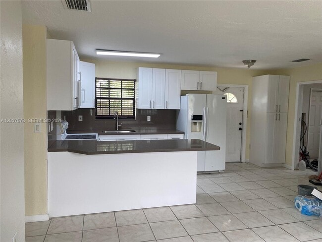 Building Photo - 3460 NW 208th St