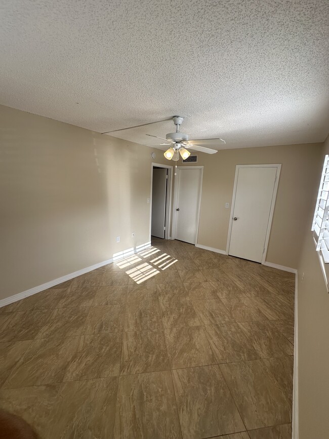 Building Photo - Poinciana Condominiums