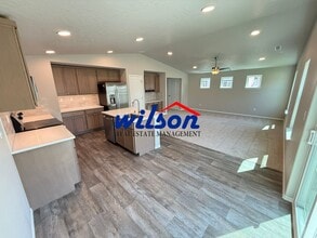 Building Photo - Stunning Brand New Townhouse w Fenced Yard...