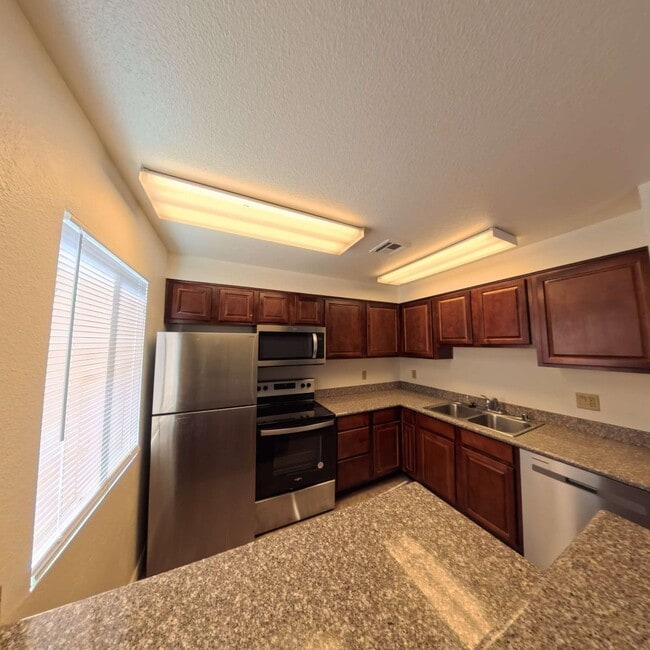 Building Photo - Gated Community | Close To The Strip | 2nd Floor Unit