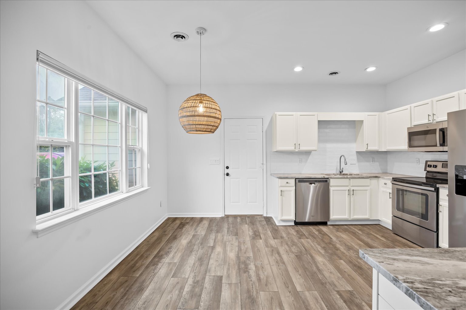 Kitchen & Dining (Custom blinds on bay window included) - 2204 Loblolly Ct