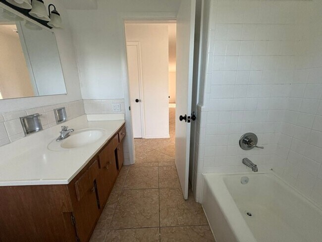 Building Photo - ****TWO WEEK FREE**** Charming 2-Bedroom Ranch in Cape Coral’s Bimini Basin Neighborhood