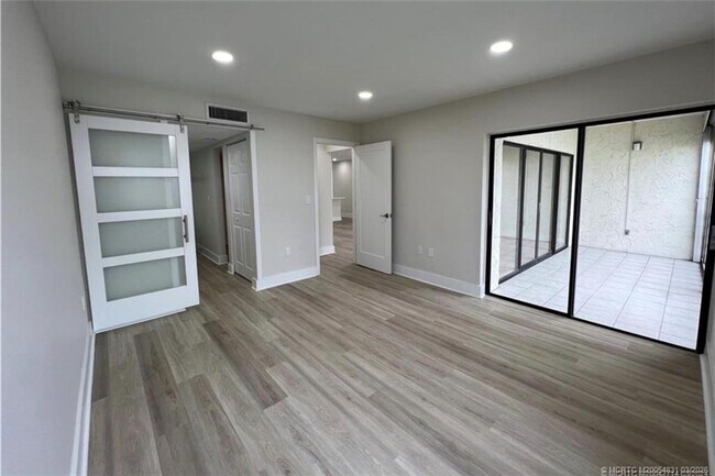 Building Photo - 1950 SW Palm City Rd