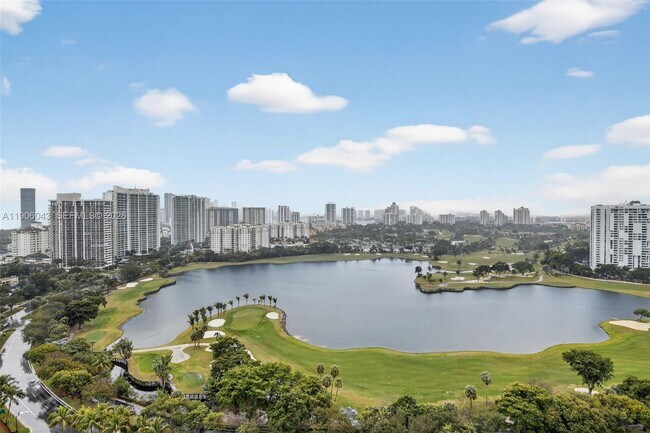 Building Photo - 3675 N Country Club Dr