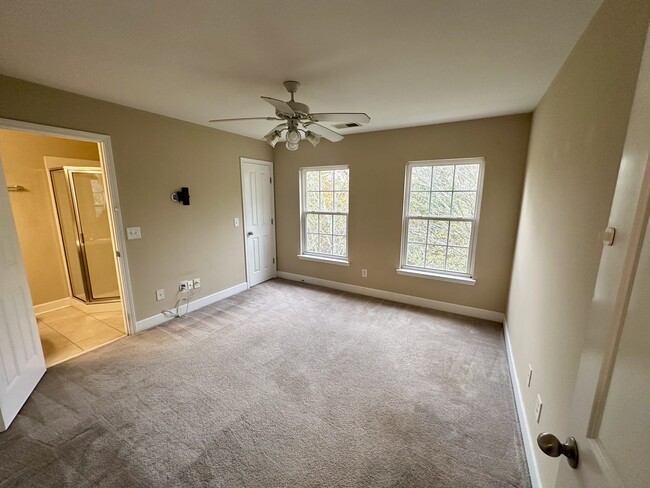 Bedroom 2 with walk in closet and full bath - 8608 Gauphin Pl