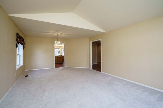 Building Photo - Beautifully Landscaped 1/4 acre with Well Maintained 4 bedroom 2 Bath Home with 3 Car Garage