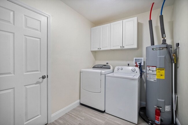 Building Photo - ANNUAL RENTAL - 2 Bedroom, 1 Bath w/ Garag...