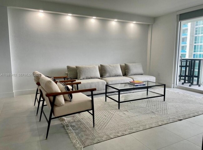 Building Photo - 10275 Collins Ave