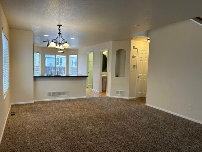 Building Photo - Spacious 3-Bedroom Home with Fenced Yard – Available Now